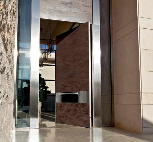 pivoting front door security with rust finish