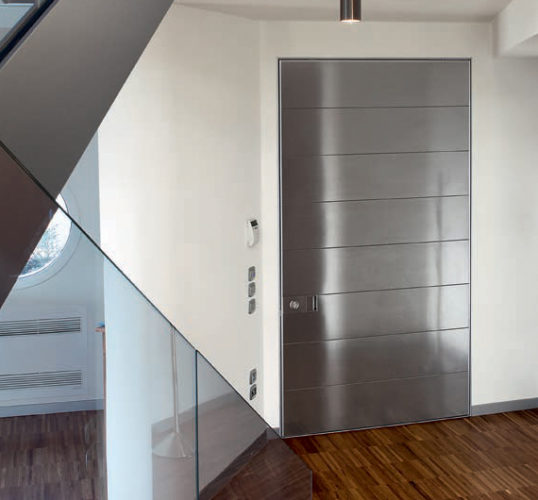 mirrored security door flush with wall