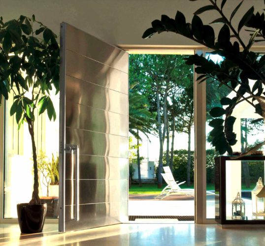 mirrored pivot door for luxury home
